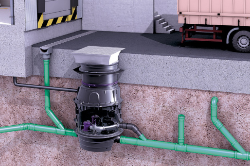 Rampe de chargement dotée d'une grande surface extérieure, dont le drainage est assuré par un hybride poste de relevage Ecolift XL.