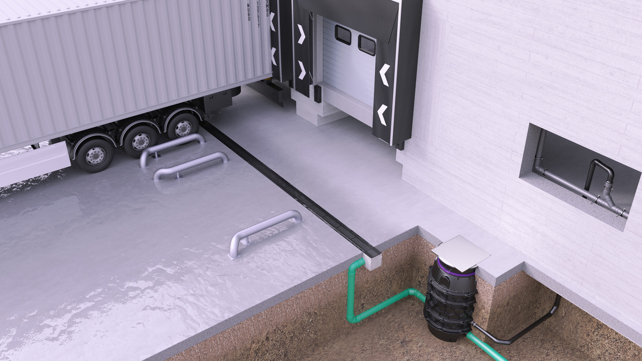 Représentation d'une rampe de chargement avec un camion, une rigole de drainage et une canalisation dans un hybride poste de relevage.