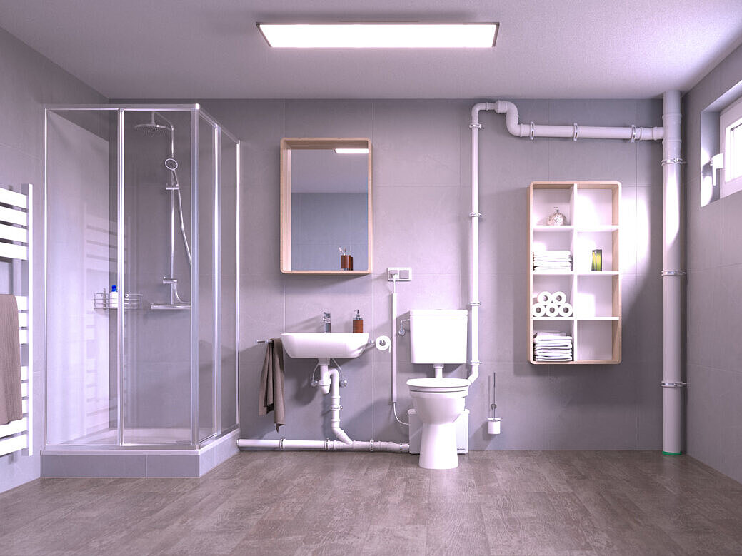 Cave équipée d'un WC et d'une douche, dont l'évacuation s'effectue via un petit poste de relevage situé derrière les toilettes.