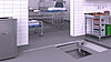 Proposition d'installation d'un caniveau à fente en acier inoxydable au niveau de la porte d'une cuisine industrielle